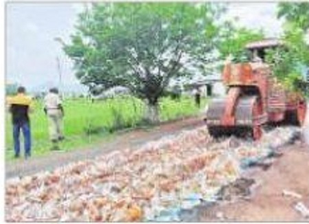 రూ. కోటి విలువైన మద్యం సీసాలు ధ్వంసం